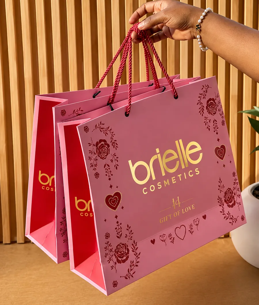 Brielle Cosmetics printed paper bags with rope handles.
