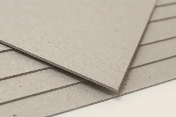 Thick greyboard sheets.